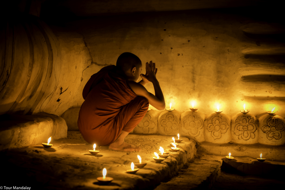 A novice monk paying his respects in Bagan